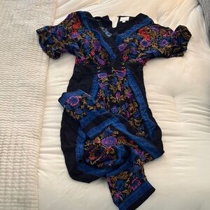 Anthropologie Black Jumpsuit with Blue, Purple and Pink Floral Embroidery